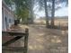 Expansive backyard with mature trees, offering a serene and private outdoor space at 328 Glenridge Ct, Indian Trail, NC 28079