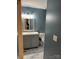 This stylish half bath features a modern vanity, updated light fixtures and neutral paint at 328 Glenridge Ct, Indian Trail, NC 28079