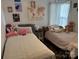 This bedroom features two twin beds and coordinated decor at 328 Glenridge Ct, Indian Trail, NC 28079