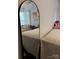 Cozy bedroom features a large mirror and comfortable furnishings, creating a warm and inviting space at 328 Glenridge Ct, Indian Trail, NC 28079
