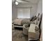 Bright bedroom showcasing a comfortable bed with plush pillows, patterned chair, and dresser at 328 Glenridge Ct, Indian Trail, NC 28079