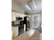 Modern kitchen with stainless steel appliances, granite countertops and white cabinetry at 328 Glenridge Ct, Indian Trail, NC 28079