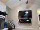 Living room showcasing fireplace and mounted TV at 328 Glenridge Ct, Indian Trail, NC 28079