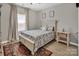 Bright bedroom featuring a comfortable bed, natural light, and a cozy atmosphere for relaxation at 3313 Plum Dr, Monroe, NC 28110