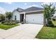 Charming single-story home with a two-car garage, well-maintained lawn, and curb appeal at 3313 Plum Dr, Monroe, NC 28110