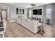 Bright living room featuring hardwood floors and a neutral color palette at 3313 Plum Dr, Monroe, NC 28110