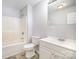Bathroom featuring tub/shower, toilet, single sink vanity, mirror, and modern flooring at 333 Friendship Dr, Rock Hill, SC 29730