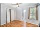 Bedroom featuring wood-look floors, a closet, and a window with natural light at 333 Friendship Dr, Rock Hill, SC 29730