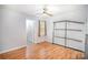 Bedroom with light-colored walls, wood-look floors, ceiling fan and window with natural light at 333 Friendship Dr, Rock Hill, SC 29730