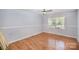 Clean living room with wood floors and a large window for natural light at 333 Friendship Dr, Rock Hill, SC 29730