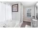 This bathroom features a separate shower and tub with granite countertop at 3705 Chesapeake Pl, Waxhaw, NC 28173