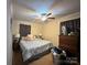 Bedroom with blue bedding and ceiling fan at 408 E Blume St, Landis, NC 28088