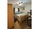 Cozy bedroom with a wooden bed frame and ceiling fan at 408 E Blume St, Landis, NC 28088