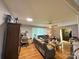 Inviting living room with hardwood floors, a ceiling fan, and comfortable seating, creating a relaxing atmosphere at 408 E Blume St, Landis, NC 28088