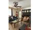 Comfortable living room with ceiling fan, couches, an area rug, and a television at 408 E Blume St, Landis, NC 28088