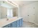 Bright bathroom with double sink vanity, a large mirror, and a separate shower and tub area at 4230 Chatterleigh Dr, Monroe, NC 28110
