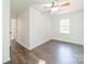 Bright bedroom featuring a ceiling fan and a window with natural light, offering a cozy and inviting space at 4230 Chatterleigh Dr, Monroe, NC 28110