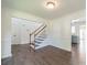Open living room with hardwood floors and a stairway to the upper level at 4230 Chatterleigh Dr, Monroe, NC 28110