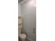 Bathroom featuring toilet, shower, and shelves at 44112 Harper Hearne Rd, New London, NC 28127