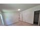 Spacious bedroom featuring neutral carpet, closet, and an adjoining room at 44112 Harper Hearne Rd, New London, NC 28127