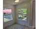 Bright dining space featuring two large windows and neutral wall colors at 44112 Harper Hearne Rd, New London, NC 28127