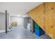 Unfinished basement with concrete floor and access to additional storage space at 485 Johnson St, China Grove, NC 28023