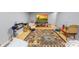Spacious basement with laminate floor and a large area rug, offering a versatile space for various activities at 485 Johnson St, China Grove, NC 28023