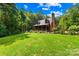 Charming home on a lush lot surrounded by trees and mature landscaping at 485 Johnson St, China Grove, NC 28023