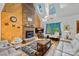 Inviting living room with a brick fireplace, vaulted ceilings, and hardwood floors at 485 Johnson St, China Grove, NC 28023