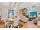 Bright living room featuring hardwood floors, comfortable seating, a brick fireplace, and ample natural light at 485 Johnson St, China Grove, NC 28023
