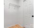 This storage closet has wood flooring and wire shelving for optimal organization at 4894 Prowess Ln, Indian Land, SC 29707