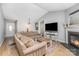 Spacious living room with vaulted ceilings, fireplace, and hardwood floors at 4894 Prowess Ln, Indian Land, SC 29707
