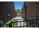 Fenced in backyard with stone paver patio and walkway at 5268 Courtyard Ln, Belmont, NC 28012