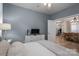 This bedroom with attached dining room, a ceiling fan, and a view of the dining room at 5268 Courtyard Ln, Belmont, NC 28012