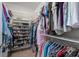Walk-in closet with organized shelving and hanging rods for ample storage at 5268 Courtyard Ln, Belmont, NC 28012