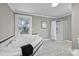 Bright bathroom with a shower, soaking tub, and a window offering natural light and a view at 550 Woodleaf Barber Rd, Cleveland, NC 27013