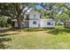 Charming two-story home with a large front yard shaded by mature trees at 550 Woodleaf Barber Rd, Cleveland, NC 27013
