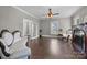 Bright living room features hardwood floors, a decorative fireplace, and stylish seating arrangements at 550 Woodleaf Barber Rd, Cleveland, NC 27013