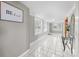 Bright living room featuring tile flooring and large windows at 550 Woodleaf Barber Rd, Cleveland, NC 27013