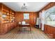 Bright office space with wood paneling, shelving, and natural light at 550 Woodleaf Barber Rd, Cleveland, NC 27013