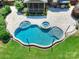 Stunning aerial view of the pool, patio, and landscaped yard of the home at 631 May Green Dr, Clover, SC 29710