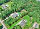 Aerial view of a beautiful property with clearly defined boundaries, pool, and lush green surroundings at 631 May Green Dr, Clover, SC 29710