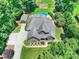 Overhead view of grand estate with pool, manicured grounds, and garage next to main house at 631 May Green Dr, Clover, SC 29710