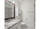 Bathroom featuring granite counters, white cabinets, and tub-shower combo with gray tile at 631 May Green Dr, Clover, SC 29710