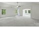Spacious, sun-filled bedroom with three windows and wall to wall carpeting at 631 May Green Dr, Clover, SC 29710