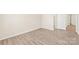 Empty bedroom with light-colored walls, wood flooring, and an inviting atmosphere at 6430 Matlea Ct, Charlotte, NC 28215