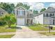 Exterior elevation of this two-story home featuring a garage and manicured lawn at 6430 Matlea Ct, Charlotte, NC 28215
