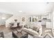 Open-concept living space integrating a living room, dining area, and modern kitchen with stainless steel appliances at 6430 Matlea Ct, Charlotte, NC 28215