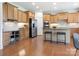 Spacious kitchen with wood cabinets, stainless steel appliances, and a breakfast bar at 7057 Shenandoah Dr, Fort Mill, SC 29707