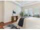 Comfortable main bedroom featuring lots of light and hardwood floors at 7057 Shenandoah Dr, Fort Mill, SC 29707